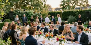 Marquee hire London setup for an elegant garden party with guests enjoying sophisticated decor.